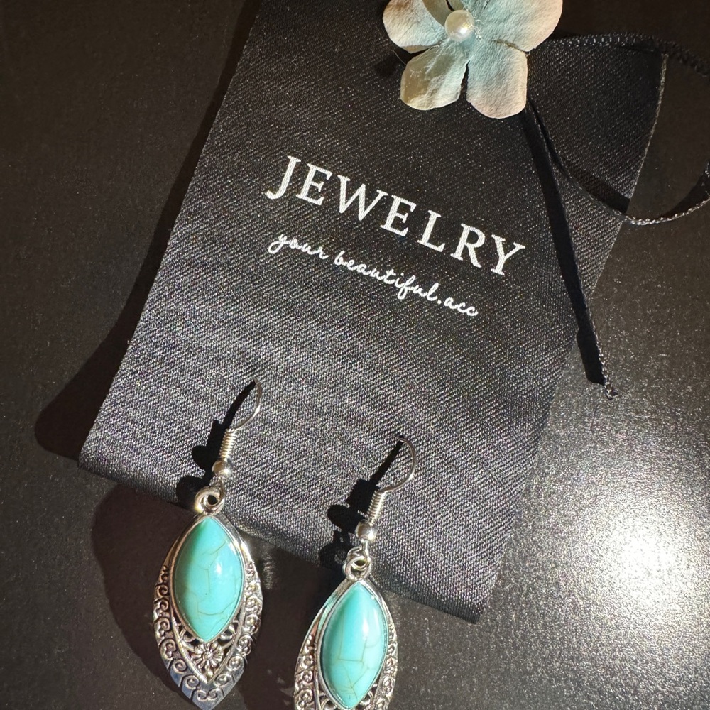 Silver and Blue Dangle Earrings with Ornate Metalwork